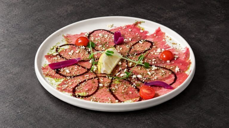 Beef carpaccio with parmesan, lemon and balsamic dressing