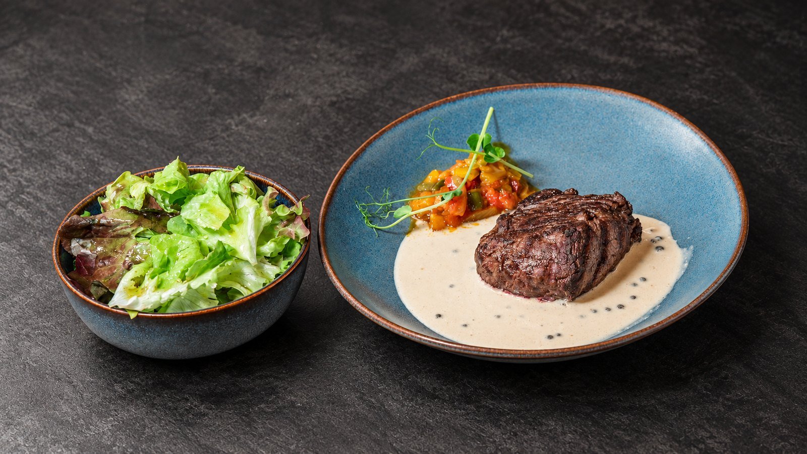 Angus beef fillet with peppercorn sauce and salad